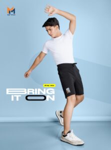 Black solid mid-rice regular-fit shorts cotton looper has an elasticated waistband with dusty colour, 2 pockets